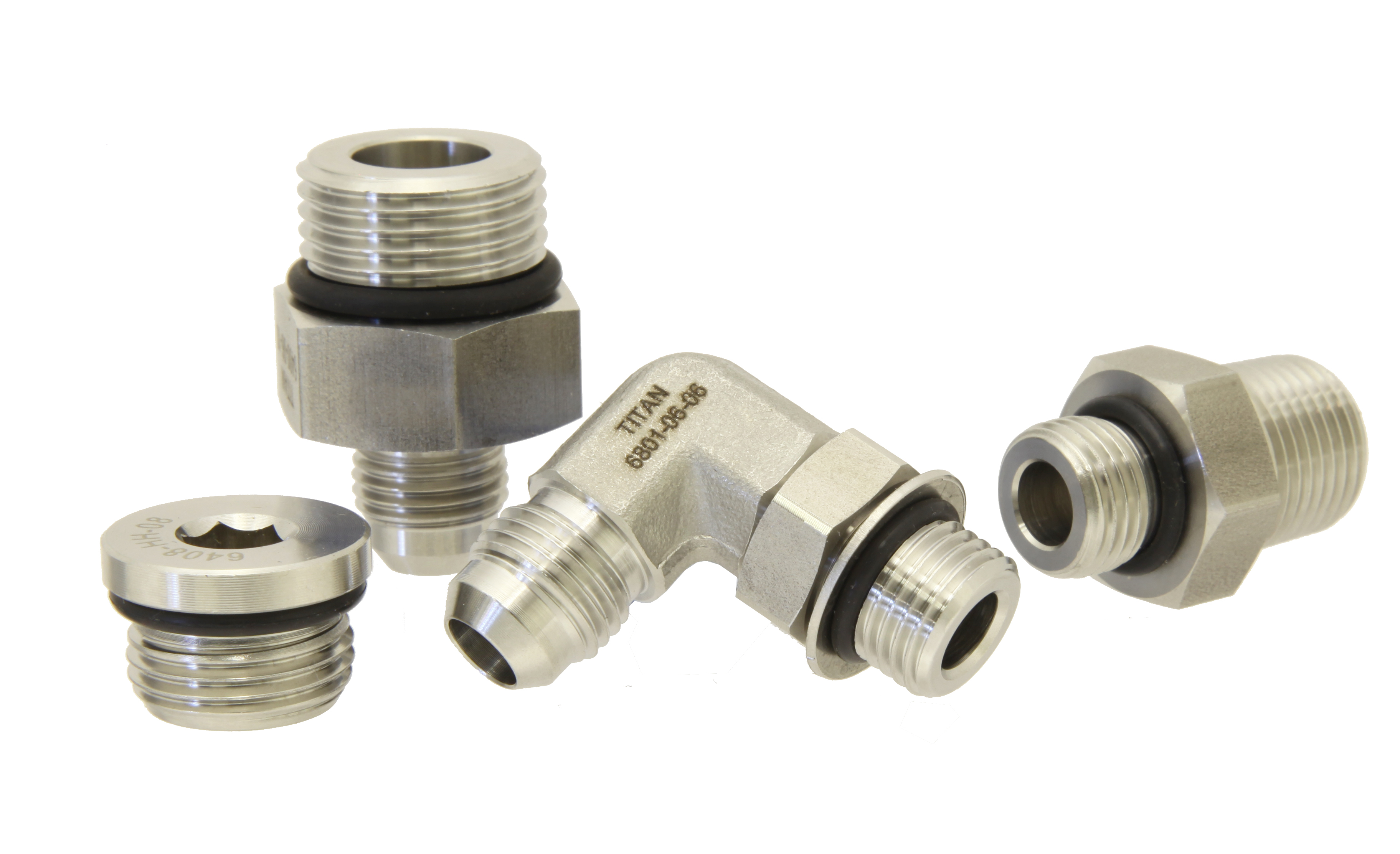 Photo showing four Titan Fittings Stainless Adapters on the white background